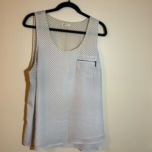 White polka dot tank with pocket and zipper details